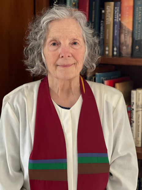 Rev. Mary Grigolia in robe.